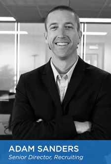 Adam Sanders Senior Director of Recruiting folding arms and smiling